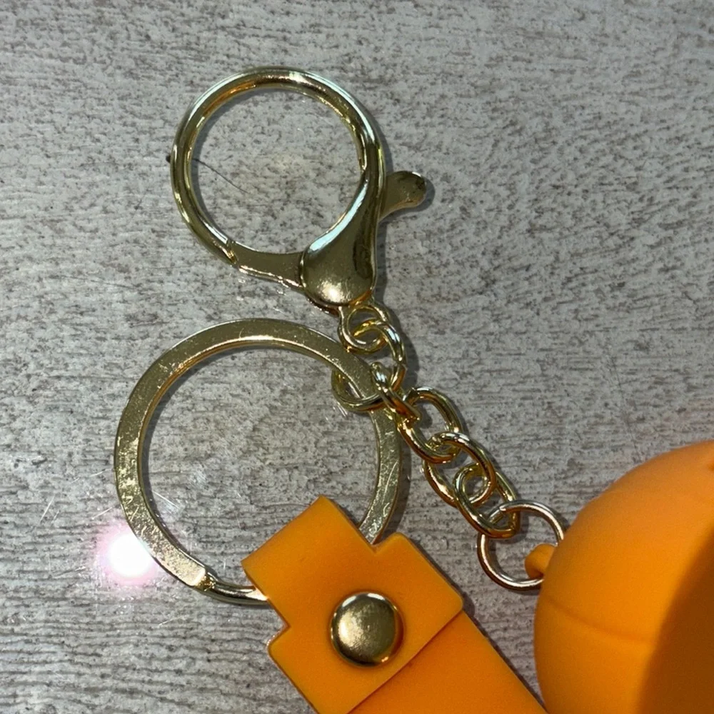 Nike Gold and Orange Cap Keychain